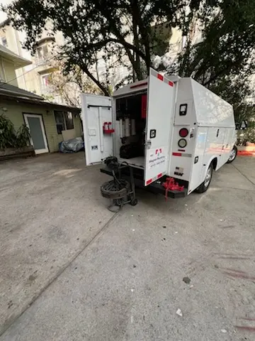 Magnet Plumbing service vehicle on-site for Water Heater Repair in Miami